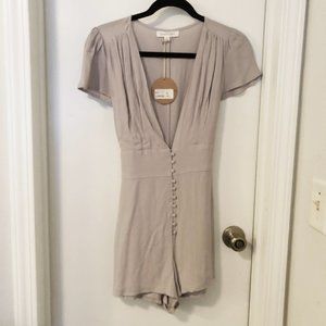 Lavender Romper with Button Detail